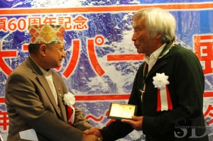 Nepalese Tourism Minister Ram Kumar Shrestha (left) shaking hand with the oldest person to scale Mt Everest Yuichiro Miura on the occasion of Everest Ffair in Toky on, Saturday June 1, 2013. Photo courtesy to Sandeep Dhungana.