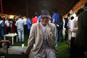 Min Bahadur Sherchan, 81 poses for photo at a function to mark the anniversary at the British Embassy, in Katmandu. Photo Courtesy to AP