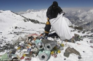 Waste: A Nepalese Sherpa collecting garbage left by climbers on the mountain. Source: dailymail.co.uk 