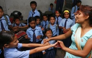 School children dancing with their teacher while marking the Teacher's Day. Photo: File photo