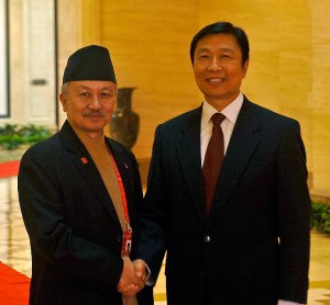 Chinese Vice President Li Yuanchao (R) meets with former Nepalese Constituent Assembly speaker Subash Nemwang during the 3rd China-Eurasia Expo & the China-Eurasia Economic Development and Cooperation Forum  in Urumqi, capital of northwest China's Xinjiang Uygur Autonomous Region, Sept. 2, 2013. Photo: Courtesy to Xinhua/Zhao Ge