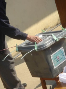 In this file photo taken during the first elections of the Constituent Assembly held on 2008, a man is seen casting his vote in the ballot box.