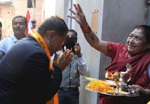 Candidate of the Nepali Congress party for Kathmandu constituency No. 1, Prakash Man Singh Shrestha, greet a woman who bless him during door-to-door poll campaign in Kathmandu. Photo: NMF 