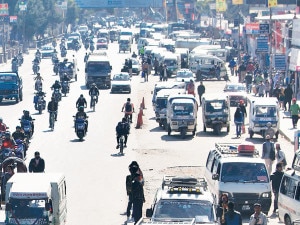 Public vehicles waiting for passengers at Sundhara, Kathmandu. Vehicles defy a transport strike called by the poll-opposing 33-party alliance on Wednesday. 