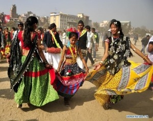 In htis file photo by globaltimes.com, girls from Tharu community performing dance during Maghi