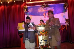 Minister for Culture, Tourism and Civil Aviation Mr. Ram Kumar Shrestha releasing In Focus, NTB's souvenir on the occasion of its 15th anniversary on January 9, 2014. Photo: NMF