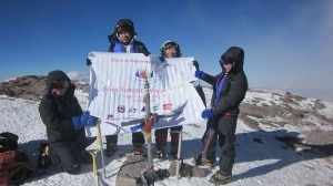 Members of the group Asha Kumari Singh, Chunu Shrestha, Pema Diki Sherpa and Nimdoma Sherpa (From left to right) with a banner of Seven Summit Women group on the top of Mount Aconcagua, the highest mountain in the Americas at 6,960.8 metres. Photo: Seven Summit facebook page