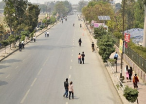 People walking along the road during bandh