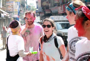 Foreign tourists enjoy Holi, at Thamel, Kathmandu. Photo:nepalnews.com/file.