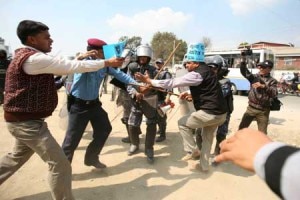 Police baton charge to students protesting against fuel price hike in the capital Kathmandu. Photo credit to kantipur