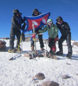 Members of seven Summit Women Group waiving flag on the top. Photo: Media 7 Summits Women