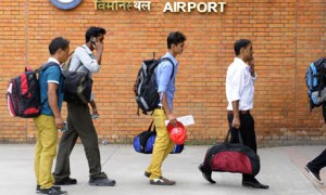 Nepalese migrant workers at Kathmandu airport. Image:AFP