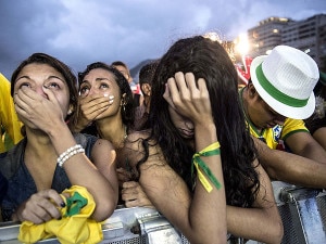 Brazil Fans in shock and despair after World Cup loss. Imag source : www.people.com