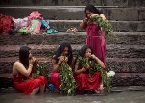 Women performing religious practices on the banks of holy Bagmati river, near Pashupatinath Temple. File image:epa03403569 Nepalese women brush their teeth with 'Danti'  a holy stick, before taking a traditional holy bath to purify themselves to mark the Rishi Panchami festival at Bagmati River in Kathmandu, Nepal, 20 September 2012. During a Rishi Panchami Nepalese women worship Sapta Rishi (seven saints), to ask for forgiveness for any sexual and religious sins committed during their monthly periods throughout the year. In Hindu religion, menstruation is taken as a symbol of impurity and women are not supposed to take part in religious practices and sexual activities during their periods. Thus, it is believed that Rishi Panchami is the occasion to wash off one's impurity for the whole year.  NARENDRA SHRESTHA