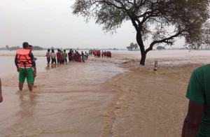  NA soldiers rescue people affected by a flood in Mohammadpur, Bardiya, Thursday. Image courtesy to M Chaudhari. 