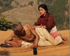 In this image, actress of film, Garima Panta seems massaging her aged husband with an age gap of around 40 years. Image:http://xnepali.net/movies