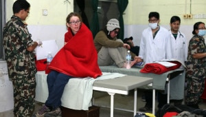 Nepal Army doctors giving intensive treatment to a trekkers at Shree Birendra Hospital Chhauni, Kathmandu on Wednesday night after rescue from Doom camp of Mustang situated near the Thorung-La pass when a massive Snowfall hits trekkers. Image courtesy to RSS