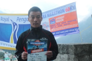 The Male title winner Pemba Sherpa with the certificate. Image courtesy to thehimalayantimes