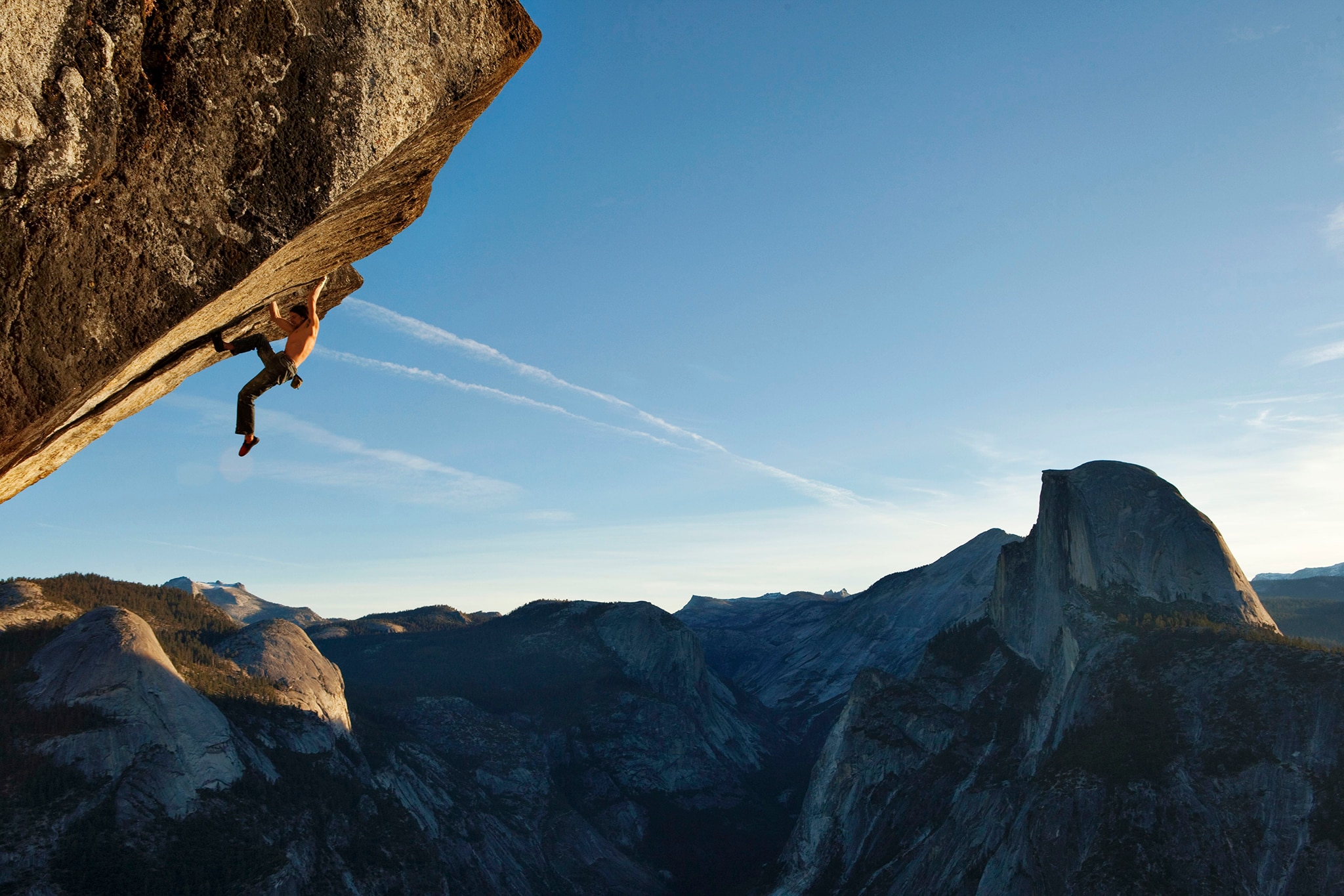 Dean Potter on Heaven, a steep and difficult roof climb a few thousand feet above the valley floor.