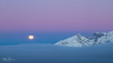 Photo of La Luna piena di febbraio illumina le Alpi nuovamente innevate