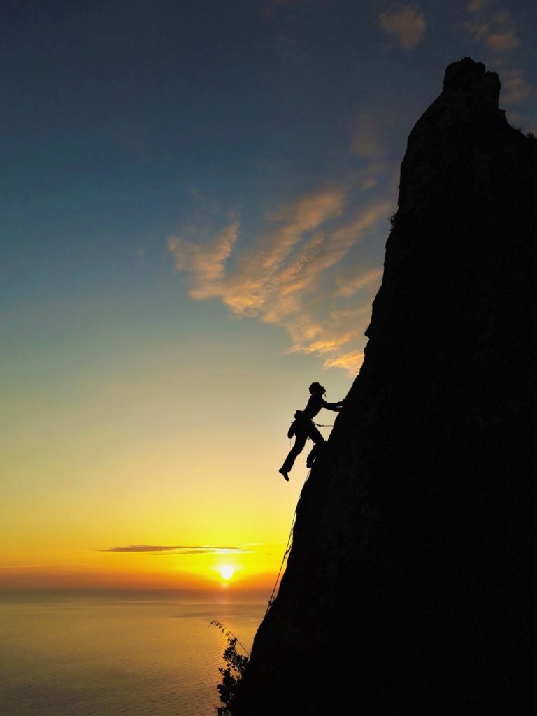 Arrampicare al tramonto a Capo d