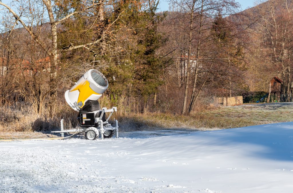 Snow cannon for producing artificial snow for ski slopes. Artificial snow system.