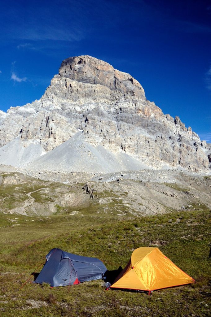 Il bello di accamparsi ai piedi di una parete. @ AdobeStock
